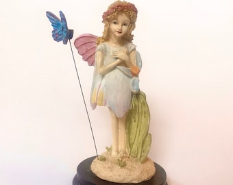 Vintage Fairy and Butterfly Figurine, Retro Resin Pink Wings Fairy with flower and blue butterfly on wood pedestal decor figurine 6".