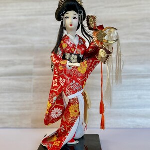 Vintage Japanese Geisha Doll Holding Samurai Helmet 12