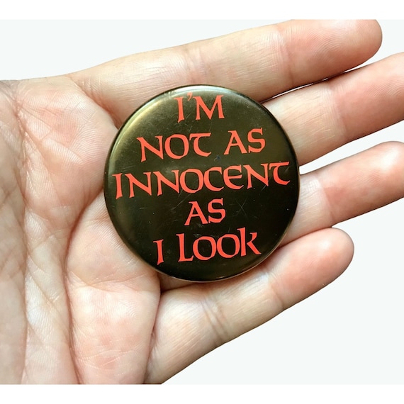 Vintage pinback button Im Not As Innocent As I Loo