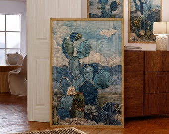 May include: Three framed art prints featuring a blue and green cactus design. The prints are framed in a natural wood frame and are displayed on a wall with a wooden cabinet and a wooden floor.