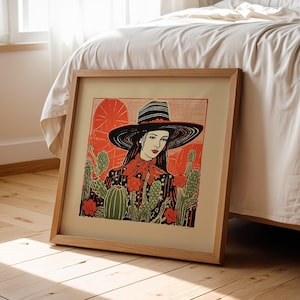 Cowgirl Wall Art Print Poster Western Theme Desert Illustration Linocut Inspired Design Southwestern Style Modern Farmhouse Aesthetic Ranch Home Decoration Bedroom Living Room Office Display Flat Brim Hat Cacti Flowers Artwork Unframed