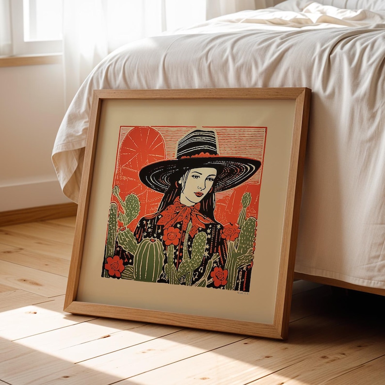 Cowgirl Wall Art Print Poster Western Theme Desert Illustration Linocut Inspired Design Southwestern Style Modern Farmhouse Aesthetic Ranch Home Decoration Bedroom Living Room Office Display Flat Brim Hat Cacti Flowers Artwork Unframed