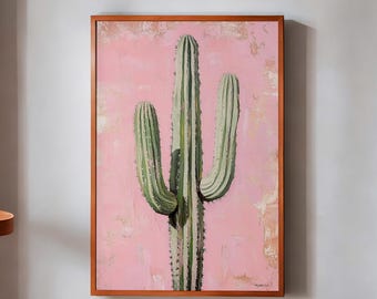 May include: A framed painting of a green cactus with three arms against a pink background.