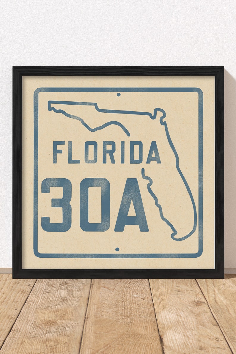 May include: A vintage-style sign with a blue outline of the state of Florida and the text "FLORIDA 30A" in blue.