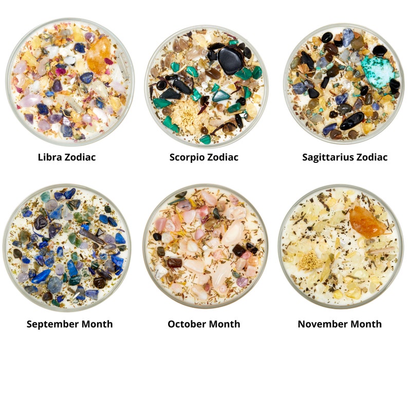 May include: Six round candles topped with various crystals, stones, and dried botanicals. Labels include Libra Zodiac, Scorpio Zodiac, Sagittarius Zodiac, September Month, October Month, and November Month, each identifying the specific candle blend.