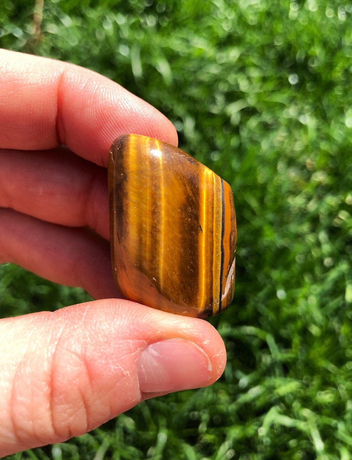 Large tigers eye stone top