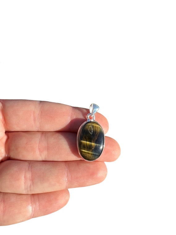 Blue tigers shop eye pendant