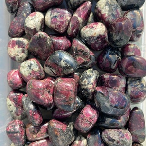 Eudialyte Stone (0.5&quot; - 1.25&quot;) Grade AA Eudialyte Tumbled Stone RARE Eudialyte Crystal - Eudialyte Stone - Biotite and Aegirine crystals