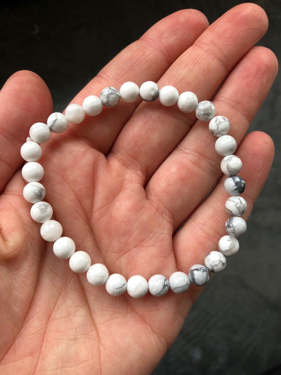 Bracciale elastico quarzo rutilato grigio 6 mm - Marakò Gioiello