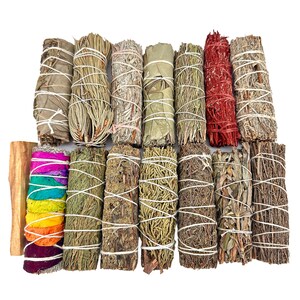 a bunch of different types of herbs tied together