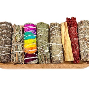 a wooden tray filled with different types of sticks