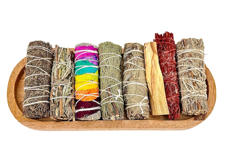 a wooden tray filled with different types of sticks