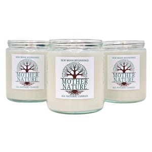 May include: Three glass candle jars with white labels. Each label has a green tree with brown branches and the text "NEW MOON BEGINNINGS" at the top. The text "MOTHER NATURE" is in a larger font below the tree. The text "ALL NATURAL CANDLES" is in a smaller font below the larger text.