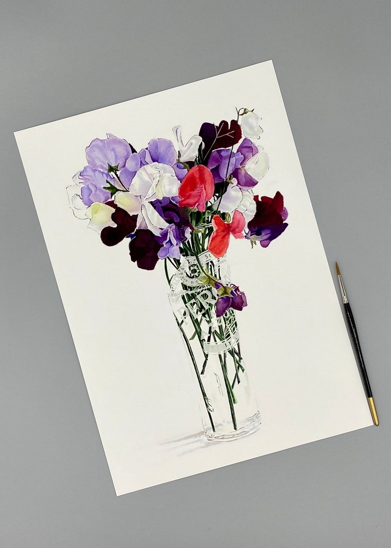 A3 size giclee print of sweet pea flowers in a Peroni beer glass laying next to a paint brush.