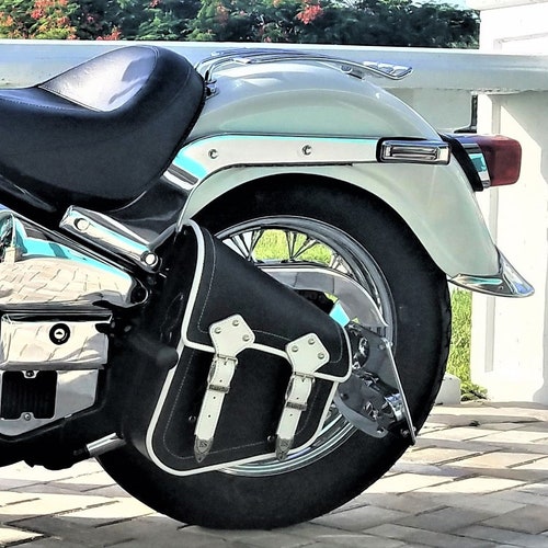 white motorcycle saddlebags