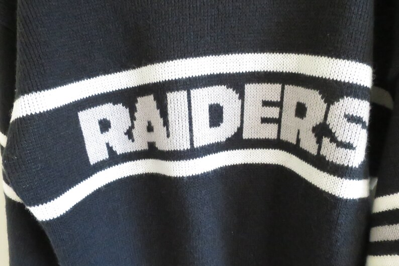 Large | Made in USA fit Vintage 80/'s Los Angeles Raiders Cliff Engle wool blend sweater tag size Medium-Large DEADSTOCK