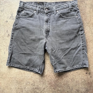 Vintage 80's Levi’s 550 faded black denim jean shorts | Waist 33” (tag size) Waist 33” (measured size) | Orange tab