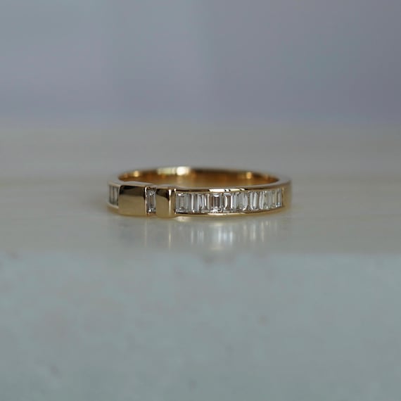14K Yellow gold ring with Baguette Diamonds