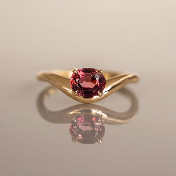 Oval Sapphire Curved 14K Yellow gold custom-made ring