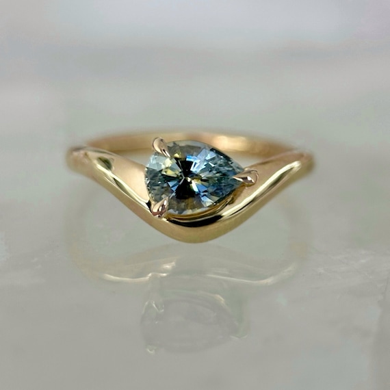 Custom made 14K Yellow gold Caia ring with Sapphire