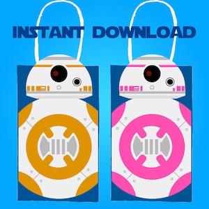 May include: Two printable gift bag designs featuring a white robot with a blue background. The robot has a round body with a yellow and pink circle in the centre. The text "INSTANT DOWNLOAD" is at the top of the image.