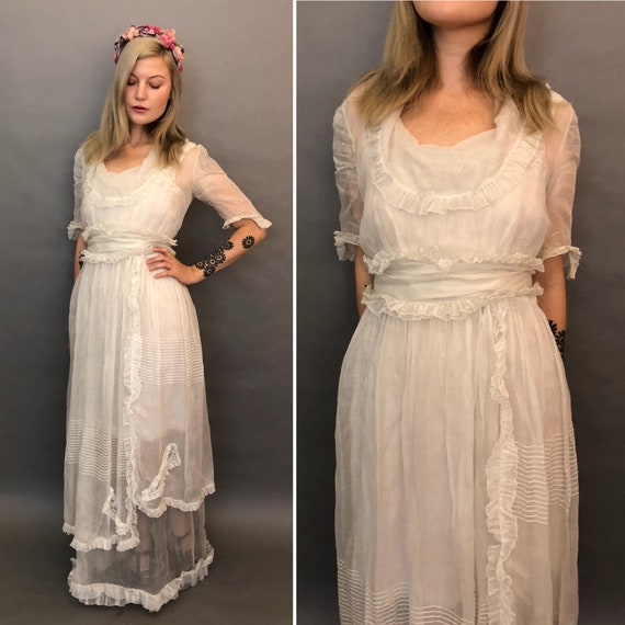 Small antique organdy gown with ruffles and layers