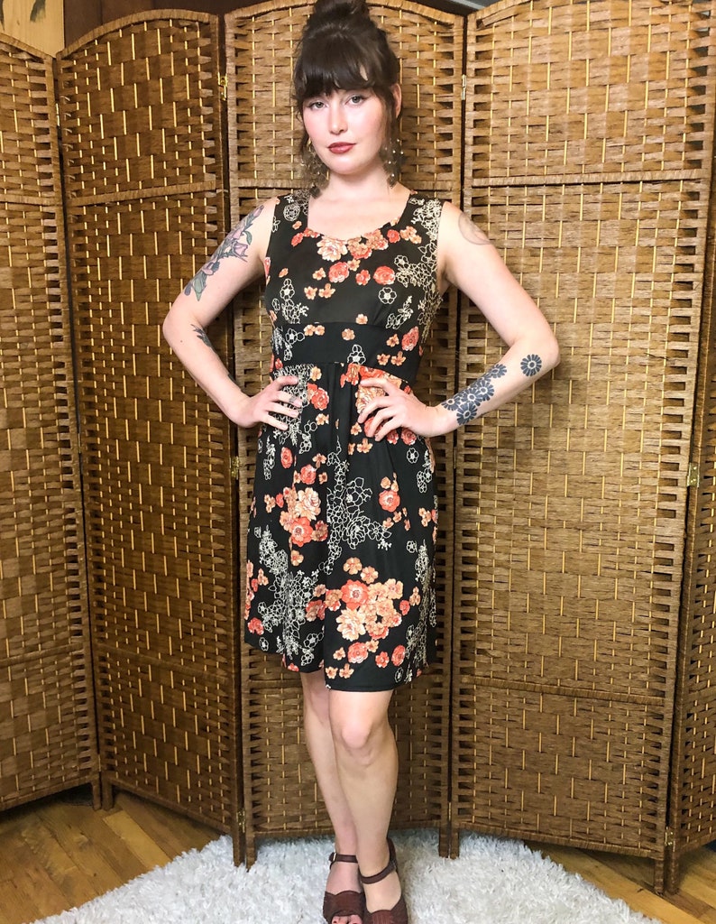 Small 1970s Floral Black Dress