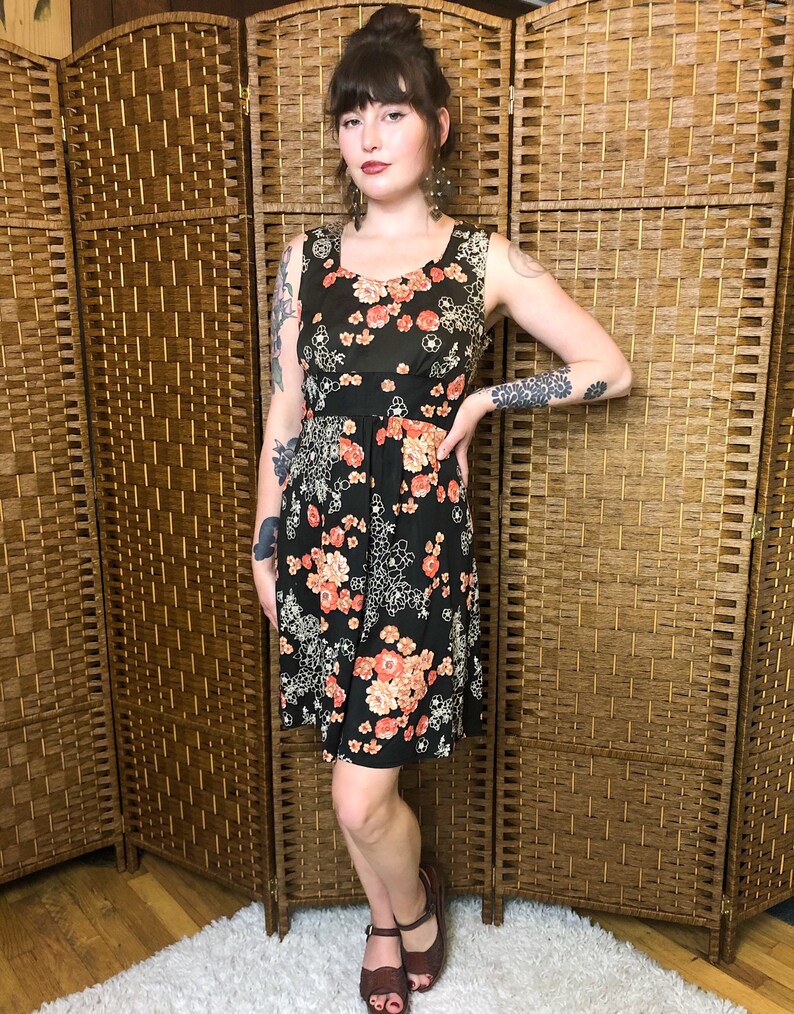 Small 1970s Floral Black Dress