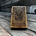 Webbed Guardian Java Teakwood Engraved Lighter product logo