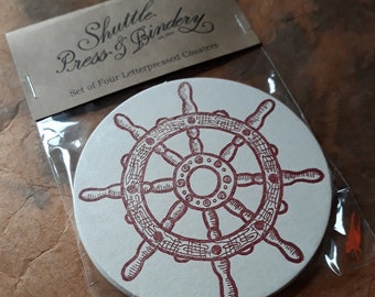 Porta-copos tipográficos para rodas de navio