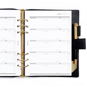 May include: A black and white planner with gold rings. The planner is open to a page labelled "Gift Planner" with sections for person, occasion, gift ideas, and date.