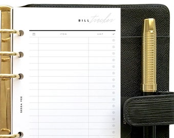 May include: A black leather planner with gold-colored rings and a matching pen. The planner is open to a bill tracker page with the words "Bill Tracker" at the top. The pen is gold and black.