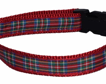 May include: Red dog collar with a plaid pattern. The collar has a black plastic buckle and a silver metal D-ring.