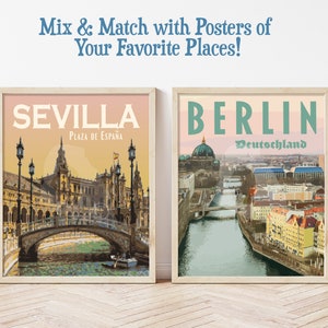 May include: Two framed travel posters, one featuring a view of Seville, Spain with the text "SEVILLA Plaza de Espana" and the other featuring a view of Berlin, Germany with the text "BERLIN Deutschland".