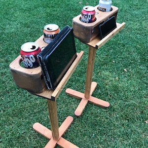 Drink holder pair with phone or digital scoreboard shelf