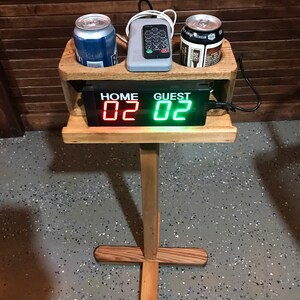 Double drink holder with scoreboard shelf