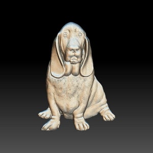 May include: A 3D printed sculpture of a basset hound dog sitting with its ears down and looking straight ahead. The sculpture is made of a light brown material and has a realistic appearance.