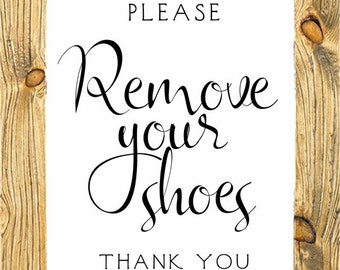 Please remove your shoes sign