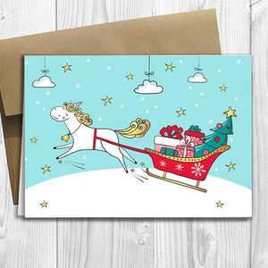 PRINTED Have a magical Christmas - 5x7 Greeting Card - Fun Whimsical Unicorn Sled Holiday Card