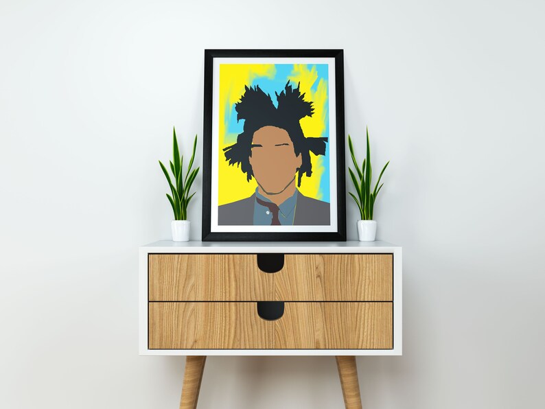 May include: A framed print of a black and white portrait of a person with a yellow and blue background. The person has a large afro and is wearing a suit and tie.