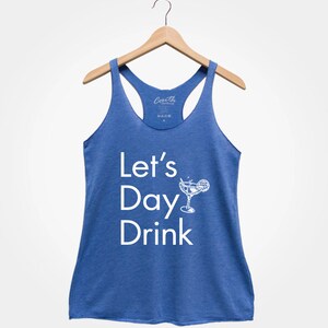 May include: A blue racerback tank top with the text "Let's Day Drink" and a white silhouette of a margarita glass with a lime wedge.