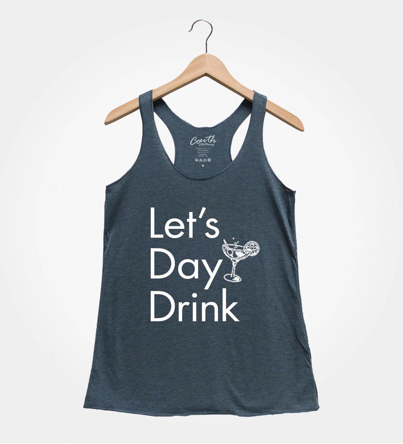 May include: A dark blue tank top with the text "Let's Day Drink" and a white illustration of a cocktail glass with a lime wedge.