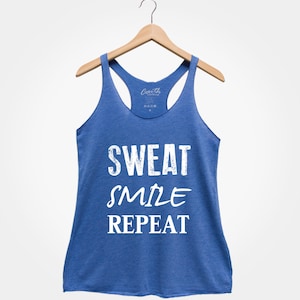 May include: A blue tank top with the text "SWEAT SMILE REPEAT" in white.