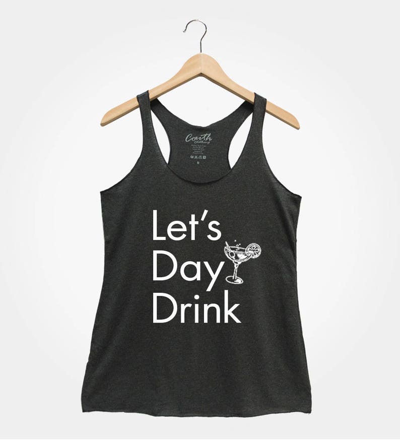 May include: A dark gray tank top with the text "Let's Day Drink" in white lettering and a white illustration of a margarita glass with a lime wedge.
