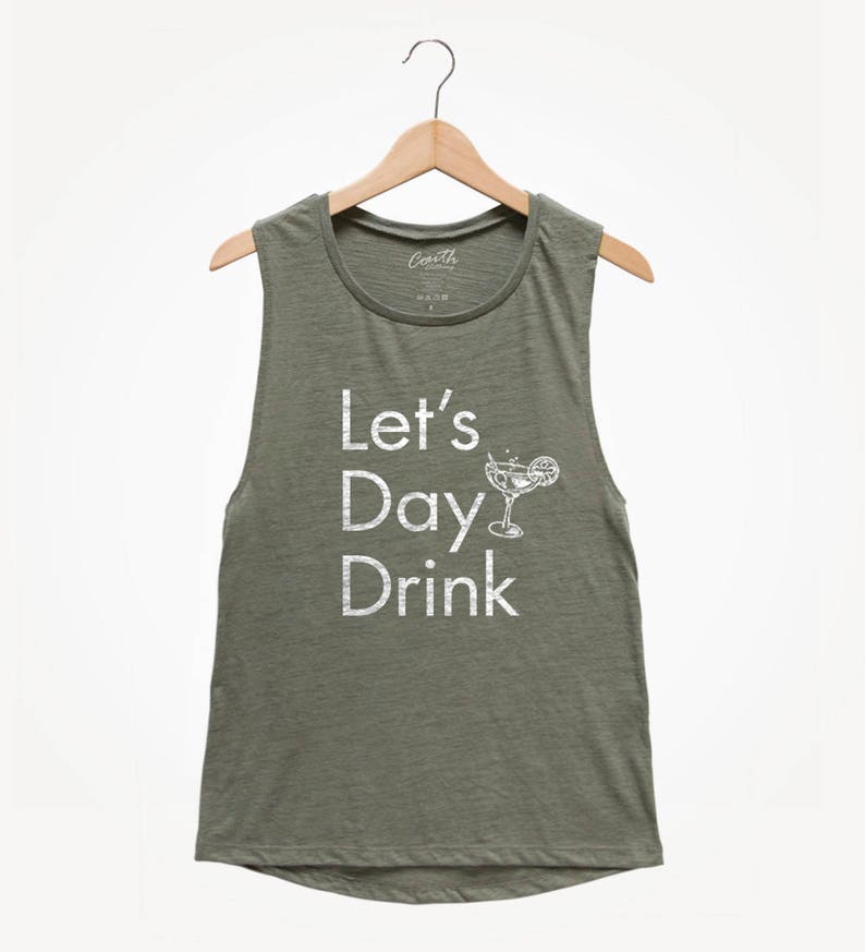 May include: A green sleeveless tank top with the text "Let's Day Drink" and a white illustration of a cocktail glass with a lime wedge.