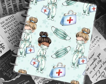 May include: A light blue planner with a repeating pattern of cartoon girls wearing white medical scrubs and face masks, carrying blue medical bags with red crosses. The planner has a white spiral binding. The text "Every child is gifted. They just unwrap their packages at different times." is printed on the bottom of the planner.