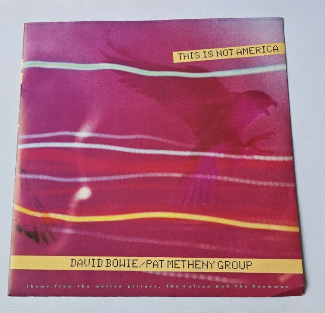 David Bowie pat Metheny Group This Is Not America 7 Vinyl Record 1985 david-bowie-pat-metheny-group-this-is-not-america-7-vinyl-record-1985