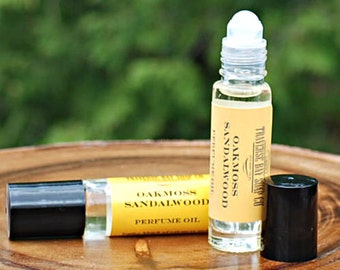 Oakmoss Sandalwood Perfume Oil.  Earthy blend of oakmoss and sandalwood with tonka bean, cedarwood, lemon and petitgrain.  Roll on perfume.