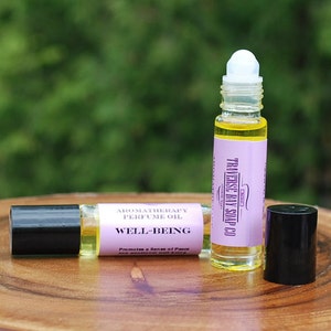 Well-Being Perfume Oil, Essential Oils,Sweet Basil,Cypress, Eucalyptus,Ginger Root,Lavender, Lemon, Sweet Orange, Peppermint, and Ravensara.