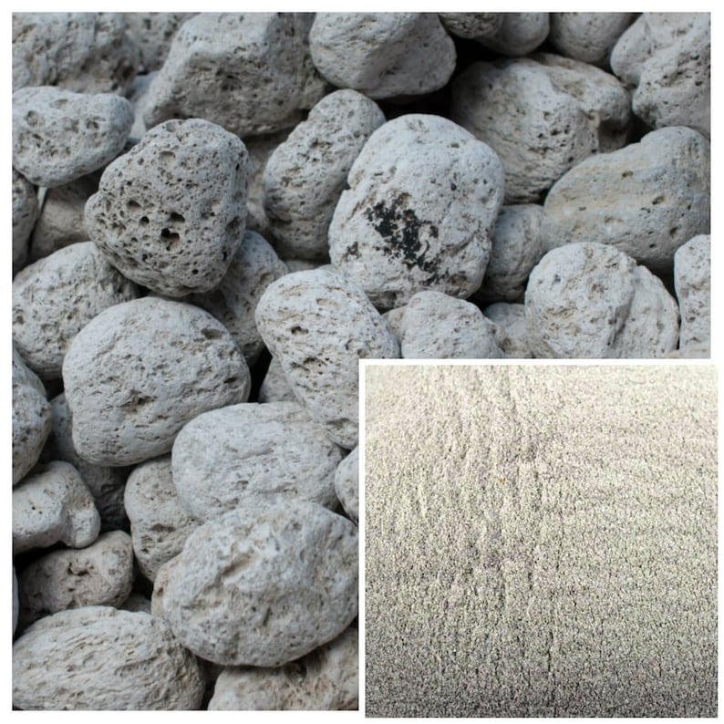 May include: Close-up of a pile of light gray pumice stones. The stones are rough and porous, with a slightly textured surface. The stones are arranged in a random pattern, with some overlapping.